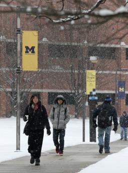 Students walking on snowy campus